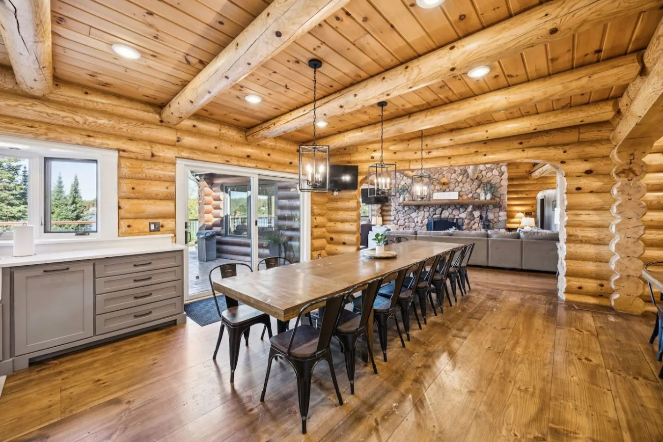 Long dining tables inside the log lodge